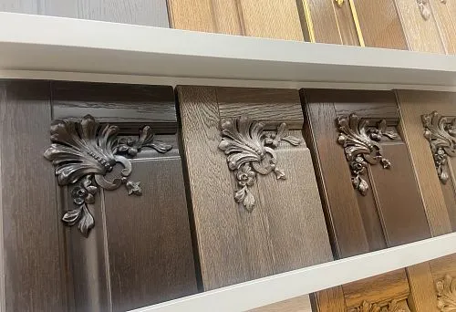 Decorative wooden panels with carved patterns, executed in classic style with high detail.
