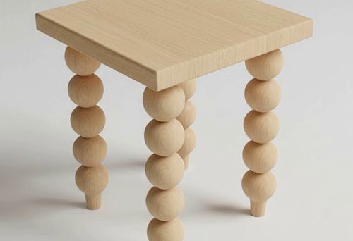Wooden stool with decorative ball-shaped legs