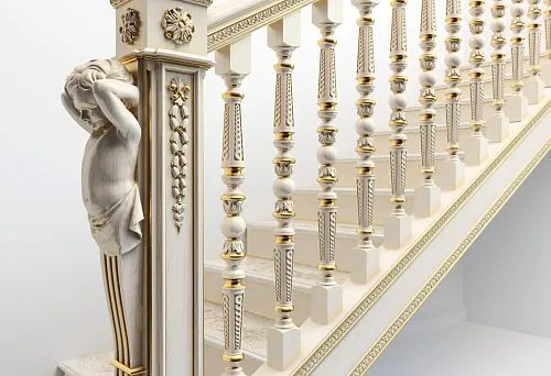 Luxurious wooden staircase with carved balusters, decorative posts, and gilded elements