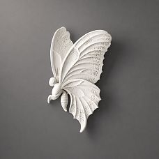 Molding decoration NPU-482R in the form of a butterfly, close-up