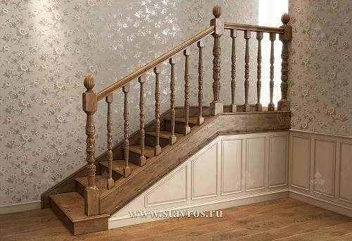 Wooden balusters with handrail in interior with floral wallpaper and paneling