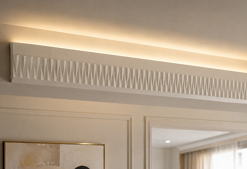 Openwork molding KPU-119 40 &times; 7 mm on the front face of the ceiling beam
