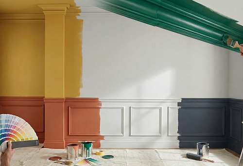 Interior demonstrating moldings painted in different colors: on the left, moldings and walls are painted in rich yellow and terracotta shades