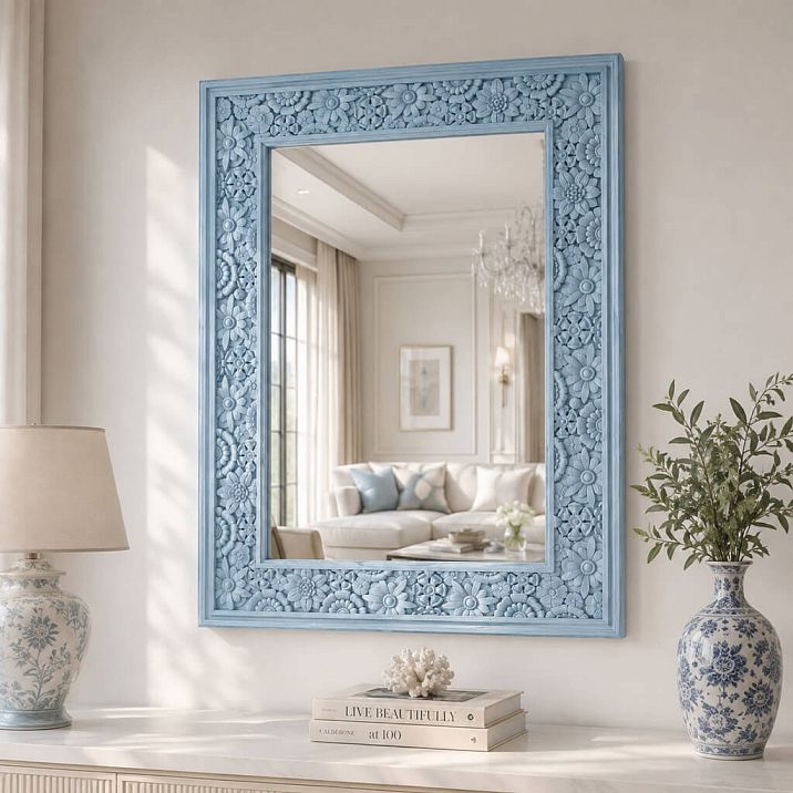 Carved frame RM-019 for a mirror in an exquisite living room interior.