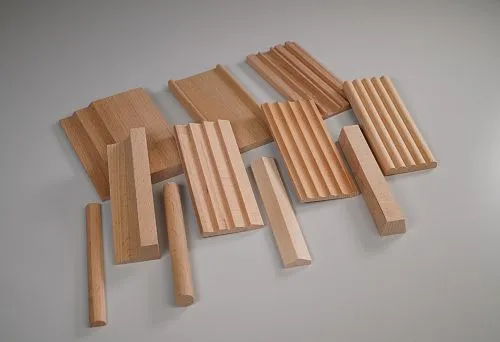 Wooden construction elements of various shapes and sizes, made from beech solid wood, intended for finishing and decorative solutions in interior design.