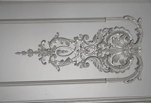 Silver-colored polyurethane facade molding with classic ornament