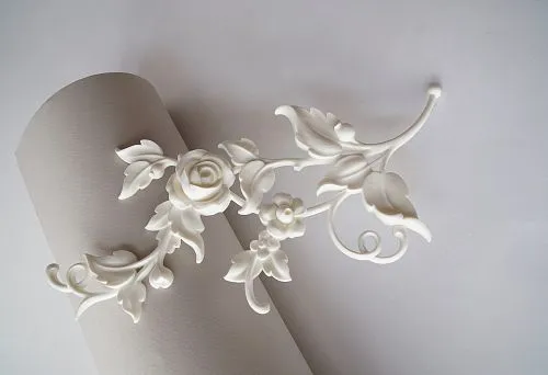 Polyurethane decorative element with floral pattern and rose