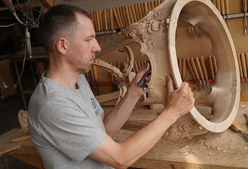Artistic Carving on a Wooden Coffee Table