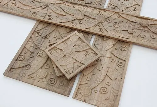 Wooden decoration in the form of panels with original patterns