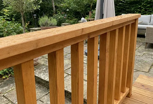 Wooden terrace balusters with moisture protection and UV coating &mdash; side view