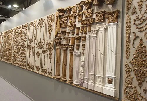 Luxurious carved columns and decorative capitals &ndash; classic wall treatment in interior design.