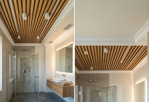 Slat panels for the bathroom ceiling and polyurethane ceiling decor in a modern bright bathroom interior
