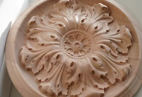 Close-up of a round carved wooden rose, showcasing the master&rsquo;s delicate craftsmanship