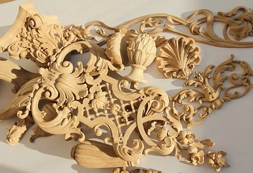 Composition of carved elements for roof and facade decoration.