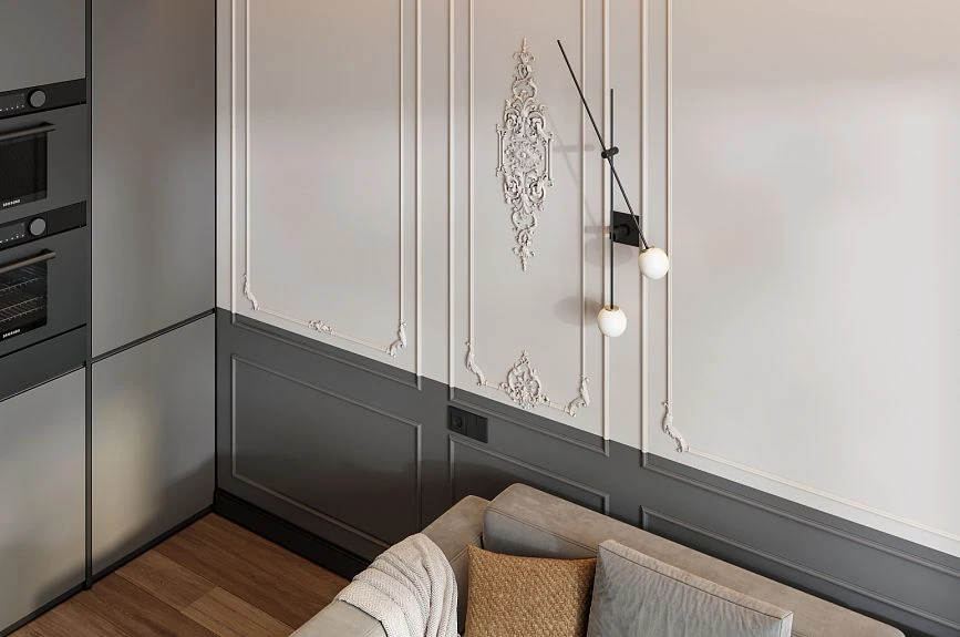 Two-tone Verona wall panels with moldings and stucco decor in the sofa area