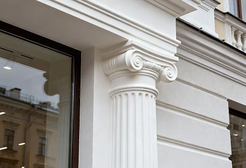Facade decoration store with column and decorative elements on the building facade