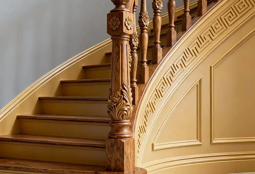 Decorative Balusters and Molding on a Wooden Staircase, Harmoniously Blending with the Room's Interior
