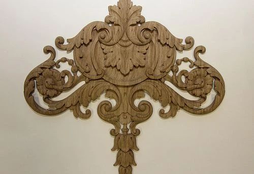 Carved wooden element on interior wall