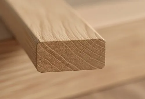 Close-up of a narrow frame profile made of light wood