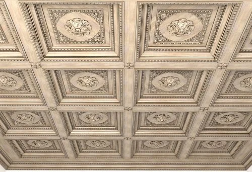 Elegant wooden ceiling with carved decorative panels