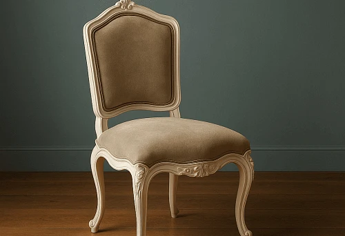Classic wooden chair with soft velvet upholstery and carved decoration against a dark wall