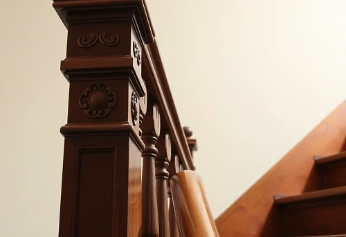 Process of installing wooden balusters on a handrail, professional installation, masterclass