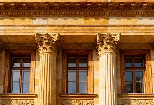 Facade decor with columns and carved elements on a building