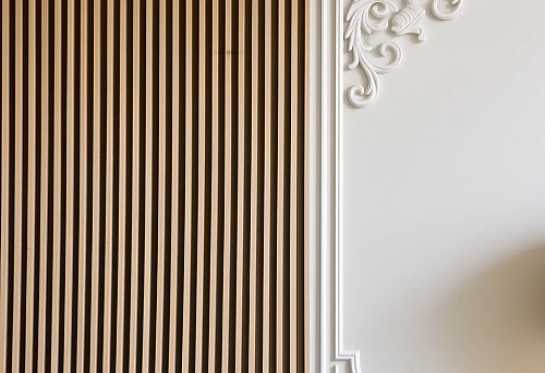 Modern Interior with Wooden Slats and Decorative Molding