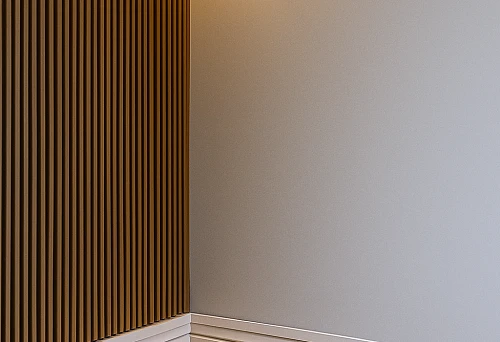 Skirting Boards with Lighting and Vertical Battens in Contemporary Space