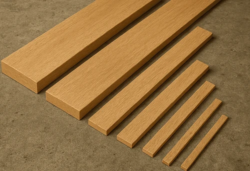 Various-sized planed wooden rails for decorative wall finishing