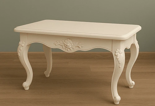 Elegant wooden table with carved decoration and curved legs on a light wooden floor.