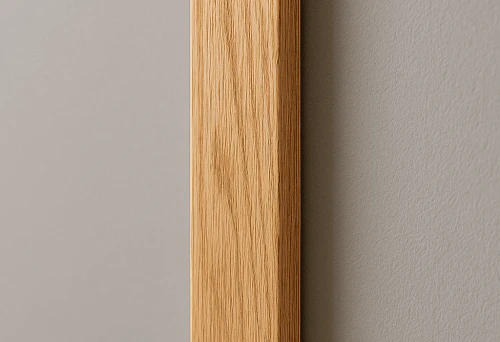Sanded wooden plank with 20x40 section on a light wall