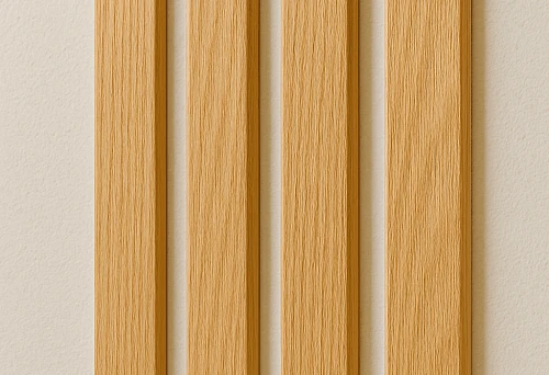 Vertical decorative wooden planks in light tone on the wall