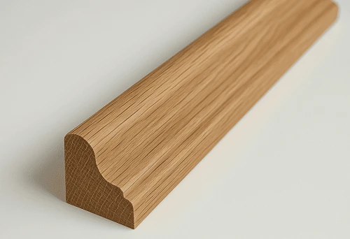 Skirting board made of natural wood with visible oak grain, close-up