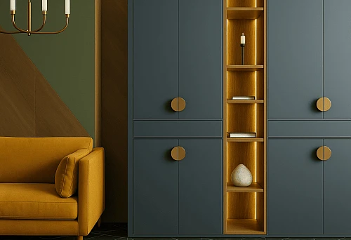 Modern cabinet with lighting and gold handles in a stylish interior.