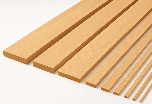 Decorative wooden strips of different sizes and thicknesses on a white background,