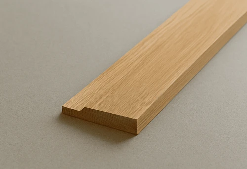 Wide Wooden Baseboard on a Neutral Background, Showcasing Clear Wood Grain Structure