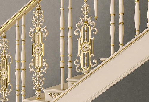 Balusters with gold decoration and elegant artistic carving on the staircase