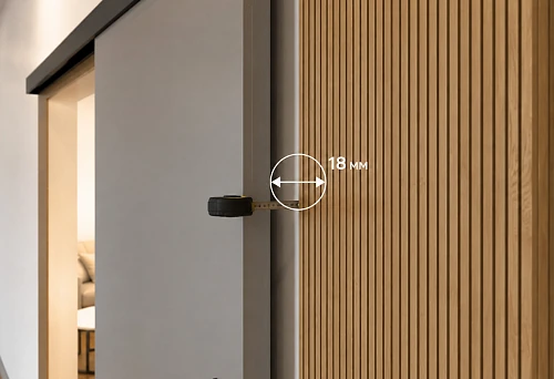 PAN-007 1010&times;8&times;2670 mm on the wall next to a sliding door with an 18 mm gap
