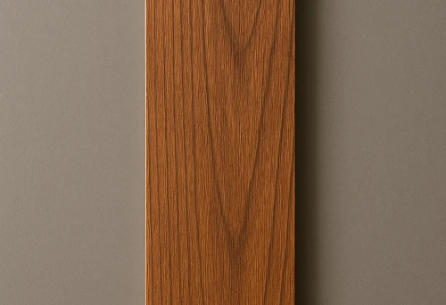 Decorative wooden molding close-up on a gray background