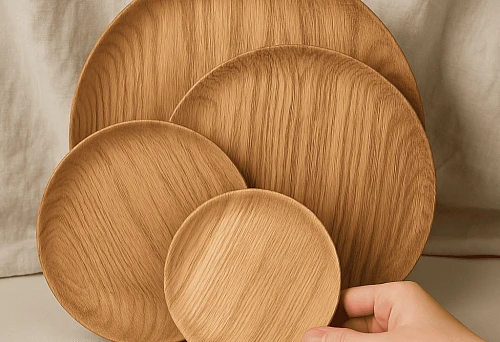 Set of round wooden plates of various sizes with expressive texture