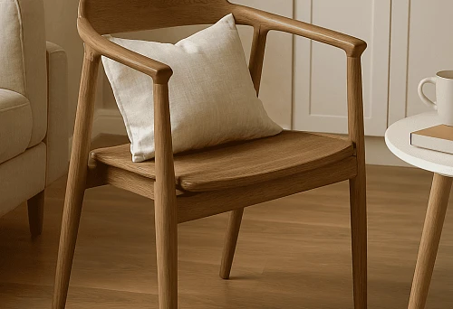 Modern wooden chair with soft cushion, placed in a bright interior