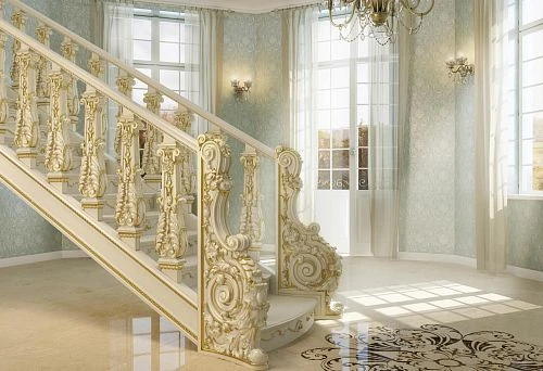 Luxurious Classic Staircase with Carved Balusters and Gold-Plated Elements Leading to the Second Floor of a Spacious Bright Hall.