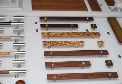 Samples of hardware and finishing materials for design planning.