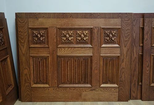 Decorative wooden panel with carved elements and handcrafted 3D ornament
