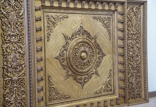 Luxurious interior design with carved wooden panels and decorative elements