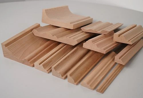 Set of wooden planks and moldings of various shapes and profiles