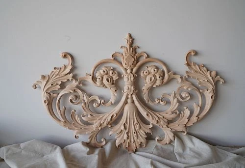 Three-dimensional decorative element made of natural wood &ndash; an elegant accent for a stylish space.