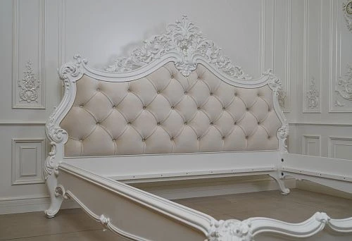 Classic bedroom with furniture in light tones and refined design.