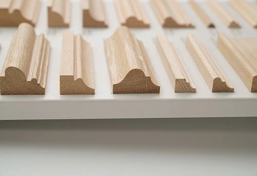 Various Profiles of Solid Wood Stair Stringers on Display Stand for Demonstrating Forms and Cross-Sections